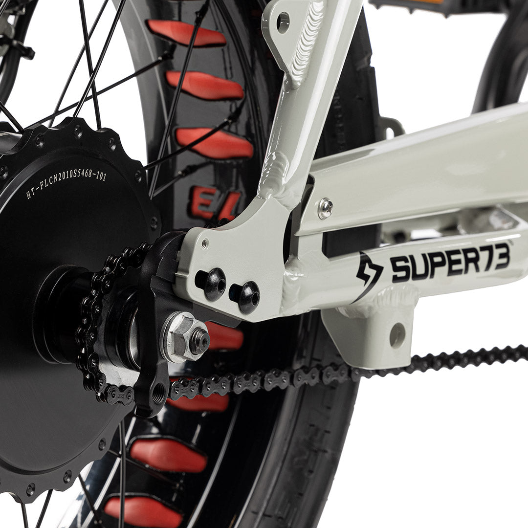 Close up shot of black chain on bike with white background. @color_black
