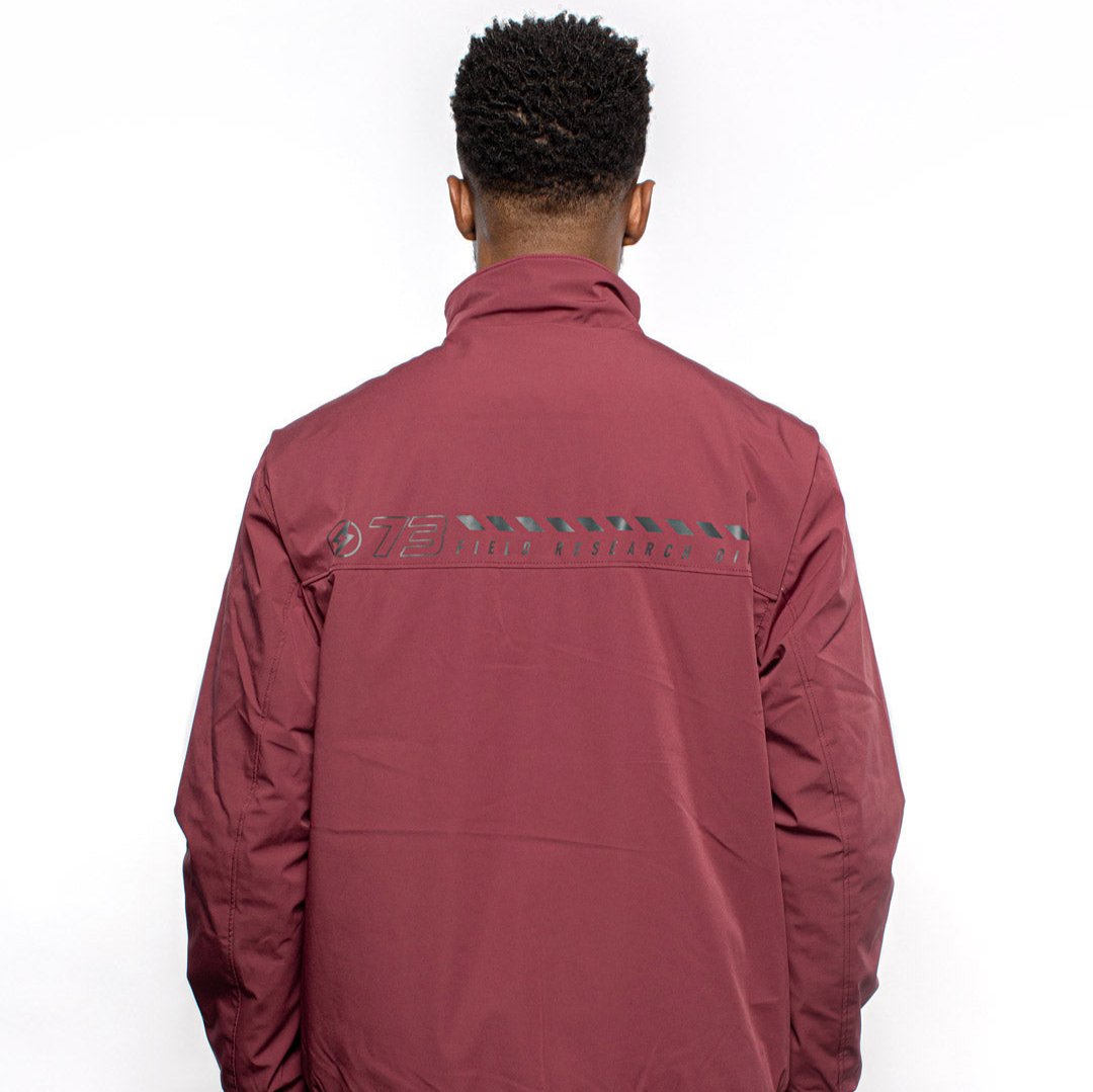 Male model wearing Royce Harrington Jacket in burgundy colorway. @color_burgundy